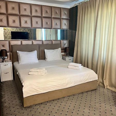 Orzu Hotel Наманган Екстер'єр фото