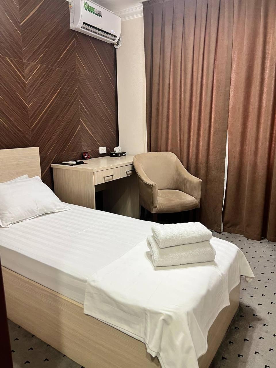 Orzu Hotel Наманган Екстер'єр фото